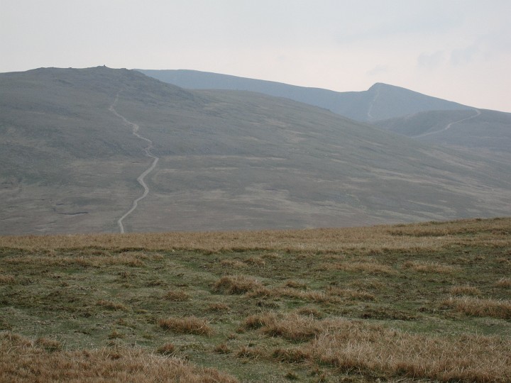IMG_3430.JPG - View from Stybarrow Dodd.  The path that I'd be following appearing and disappearing multiple times into the distance.   Raise is the first target, White Side the next(?) and Helvellyn Lower Man in the distance (?)