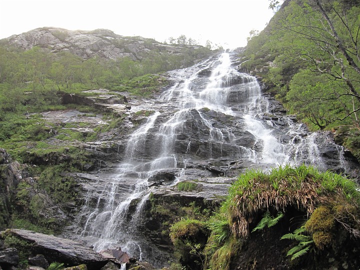 20110825-084729.JPG - Crossing the stream right under  Staell Falls. With all the recent rain it was in full spate.